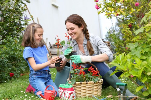 Gardener reviewing safety checklist in a residential garden