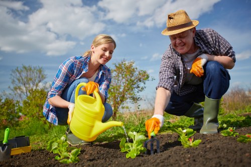 Customer showing a garden issue to a gardening team